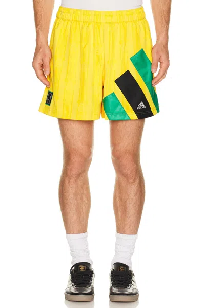 Adidas Originals X Disney X Brain Dead Patterned-jacquard Track Shorts In Yellow
