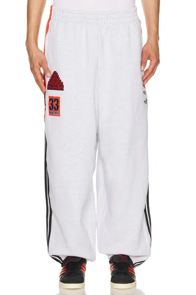 Adidas Originals X Willy Chavarria Logo-patch Side-stripe Track Pants In White