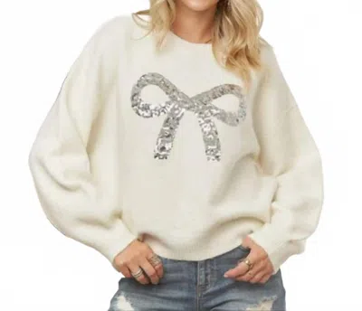 Adora Sequin Bow Sweater In Cream In White