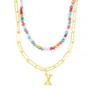 Adornia Gold Adjustable Layered Color Faux Stone Beads And Paperclip Chain Initial Necklace In Pink