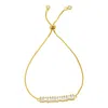 Adornia 14k Gold Plated Bolo Bracelet With Baguette Crystal Bar In Gold