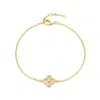 Adornia Gold Cubic Zirconia Button Clover Halo Bracelet In Gold