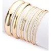 Adornia Set Of 7 Assorted Bangle Bracelets In Gold