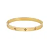 Adornia 14k Plated Stainless Steel Cz Tarnish-resistant Pave Clover Cuff Bracelet In Gold