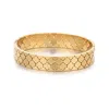 Adornia 18k Plated Stainless Steel Tarnish-resistant Clover Bangle Bracelet In Gold