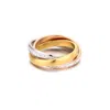 Adornia Tarnish Resistant Two-tone Cz Rolling Eternity Bands In Gold