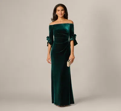 Adrianna Papell Bell Sleeve Off Shoulder Stretch Velvet Rosette Gown In Hunter In Green