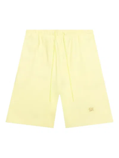 Advisory Board Crystals Logo-patch Drawstring Shorts In Yellow
