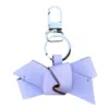 Aéhee New York Pink / Purple Bow Leather Keychain - Lavender