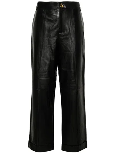 AERON CUFFED BLACK LEATHER TROUSERS WITH RELAXED FIT