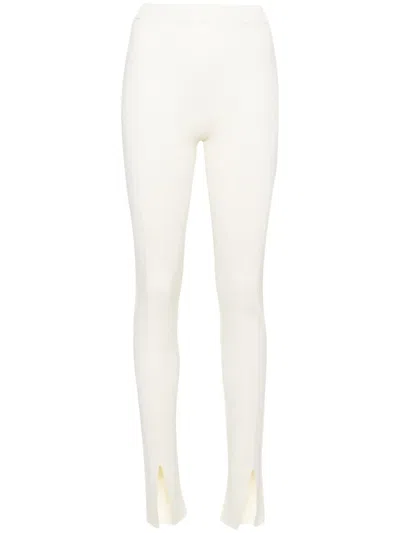 Aeron Leo Slit Ribbed-knit Leggings In Neutrals