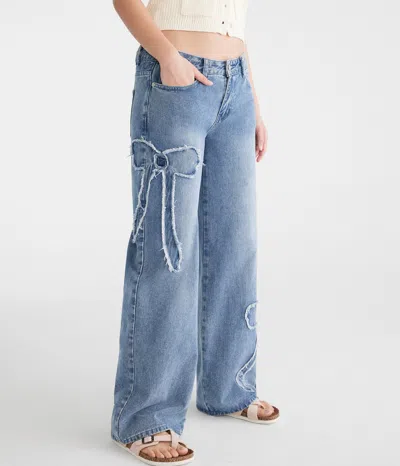 Aéropostale Low-rise Baggy Wide Leg Frayed Bows Jean In Blue