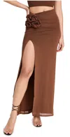 AFRM KELCE MAXI LENGTH SKIRT WITH ROSETTE DETAIL DARK CLAY
