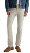 Ag Everett Slim Straight Sueded 34 In Seam Jeans In Beige In Gray