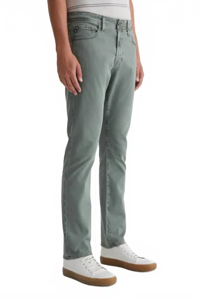 Ag Everett Sueded Slim Straight Jean In Sulfur Thorn Field In Green