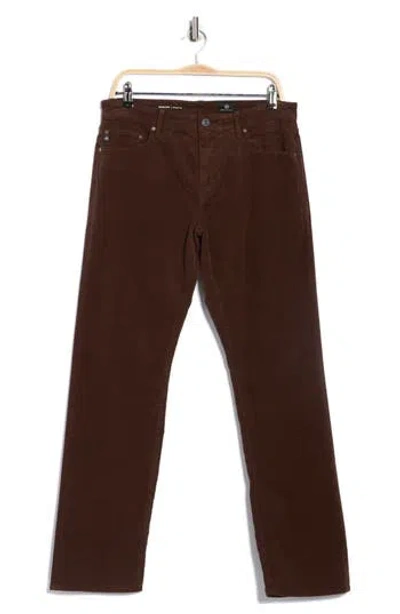 Ag The Graduate Tailored Leg Jeans In Brown