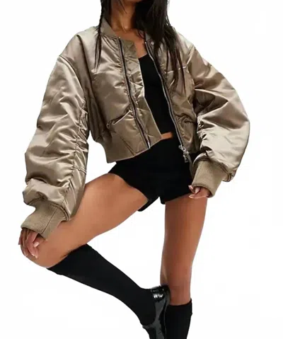 Agolde Cropped Satin Jett Bomber Jacket In Gold In Brown