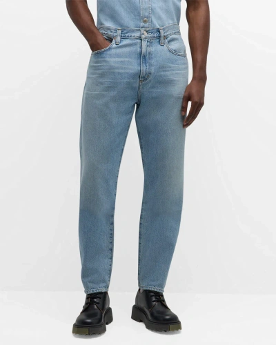 Agolde Curtis Mid-rise Tapered Jeans In Conflict (vint