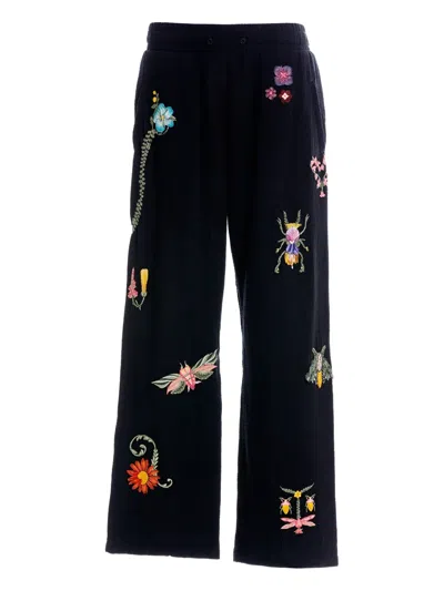 Agua Bendita Embroidered-floral Insect Trousers In Black
