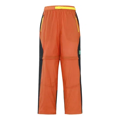Air Jordan 23 Engineered Convertible Stitched Contrast Sports Trousers For Men Yellow In Orange