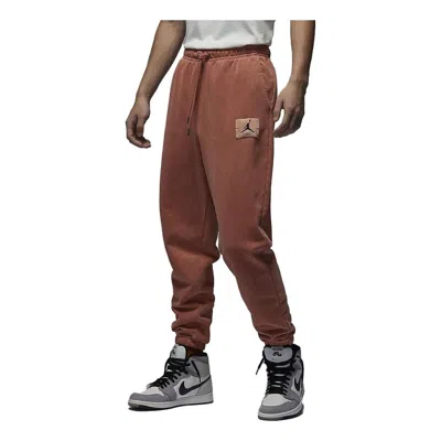 Air Jordan Essential Fleece Washed Trousers 'orange' In Brown
