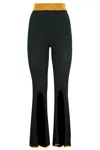 Akep Pantalone Nero A Zampa Con Spacchi In Nero
