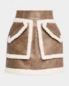 Aknvas Cherry Faux-fur Trim Mini Skirt In Peau Lainee