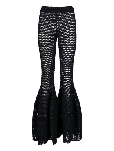 Alaïa High-rise Flared Pants In Black