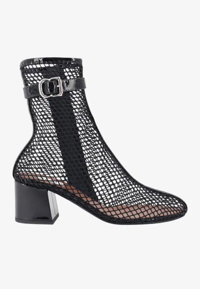 Alaïa 55 Fishnet Ankle Boots In Black