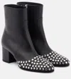 Alaïa Low Ankle Boots With Rhinestones In Black