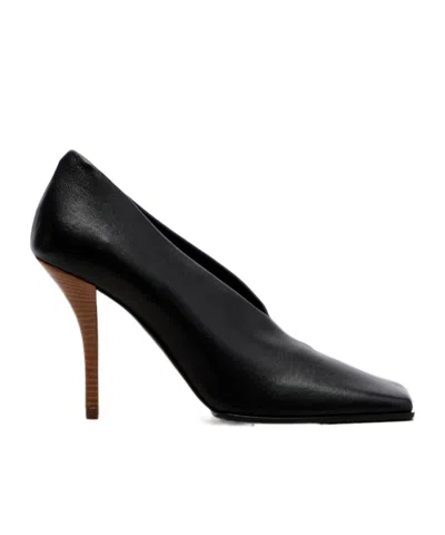Alaïa 90 Leather Pumps In Black