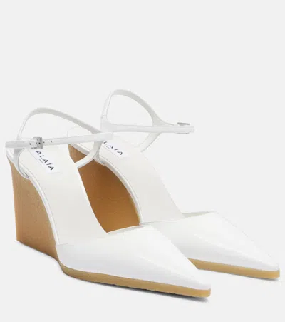 Alaïa 90 Patent Leather Wedge Slingback Pumps In White