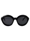 Alaïa Alaia Round Sunglasses Aa0088 S 001 In Black-black-grey