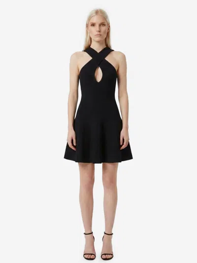 Alaïa Abito Mini In Maglia Con Incrocio Sul Davanti In Black
