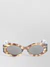 Alaïa Acetate Oval Frame Patterned Sunglasses In Brown
