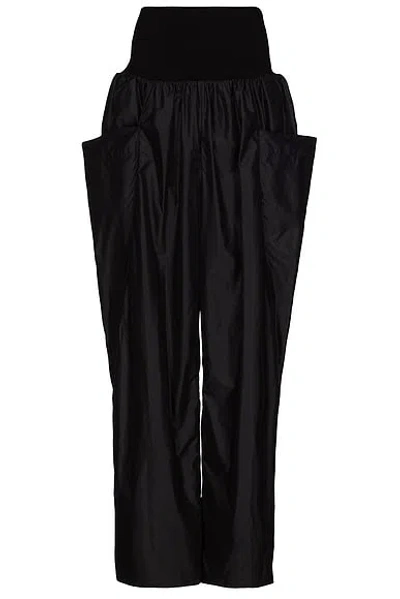 Alaïa Wide-leg Nylon And Wool Trousers In Black