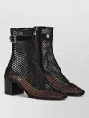Alaïa Fishnet Patent Leather-trimmed Ankle Boots In Black