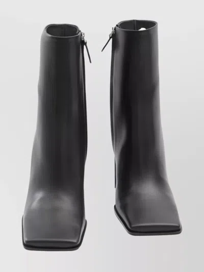 ALAÏA ANKLE BOOTS WITH SQUARE TOE DESIGN