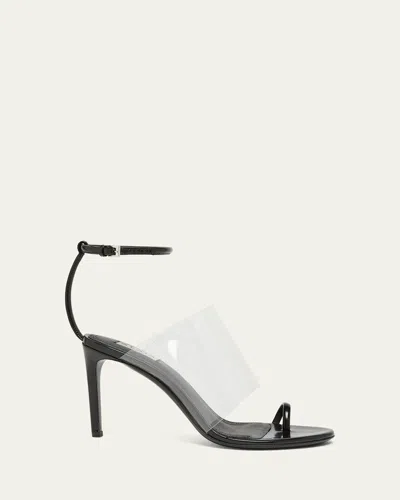 ALAÏA ASYMMETRIC CLEAR PATENT LEATHER SANDALS