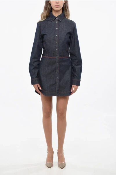 ALAÏA ASYMMETRICAL CUT DENIM SHIRTDRESS WITH SNAP BUTTONS
