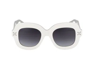 Alaïa Round Sunglasses In Gray