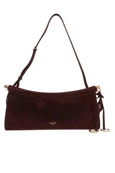 Alaïa Bags In Burgundy