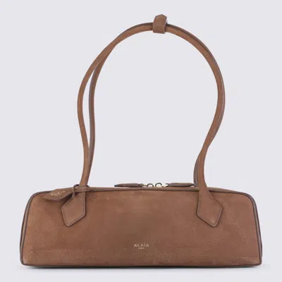 Alaïa Alaia Beige Leather Le Teckel Medium Clutch In Brown