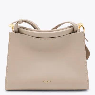 Alaïa Beige Leather Small Square Crossbody Bag In Gray