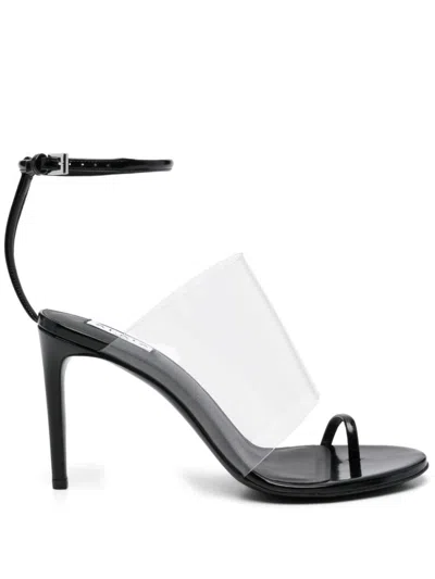 ALAÏA BLACK ASYMMETRICAL HEELS