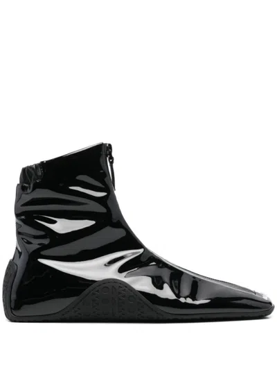 ALAÏA BLACK LEATHER SNEAKERS