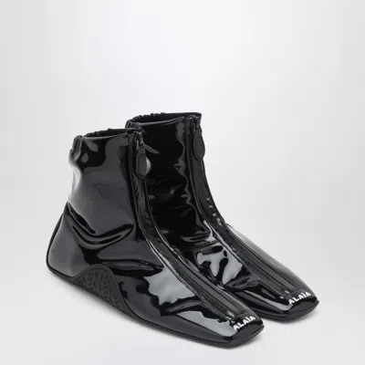 ALAÏA ALAIA BLACK SNEAKER IN COATED STRETCH FABRIC WOMEN