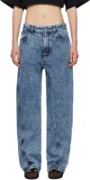 Alaïa Twisted Stonewashed Denim Jeans In Blue