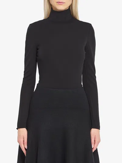 Alaïa Fluid Jersey Bodysuit With Heart Cutout In Black