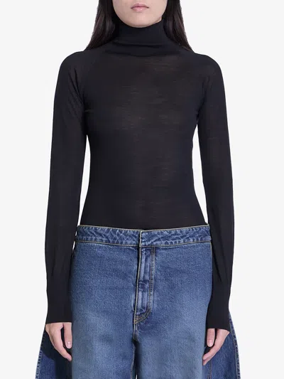 ALAÏA BODYSUIT IN SHEER KNIT